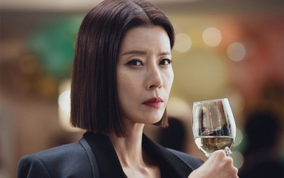 Yoo Sun Is A Wealthy Woman Who Has A Dangerous Obsession With Her Husband Park Byung Eun In “Eve”
